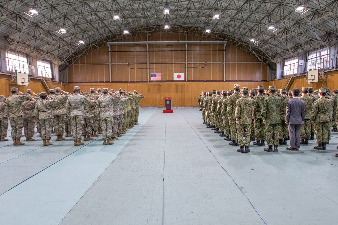 Japan Ground Self-Defense Force members and U.S. Army Soldiers participate in the Yama Sakura 83 closing ceremony at Camp Asaka, Japan, Dec. 12, 2022. The Yama Sakura training event encourages participants to work as dedicated partners in support of the US-Japan security alliance and for the continued peace and stability in the Indo-Pacific region. (U.S. Army photo by Spc. Richard Carlisi)