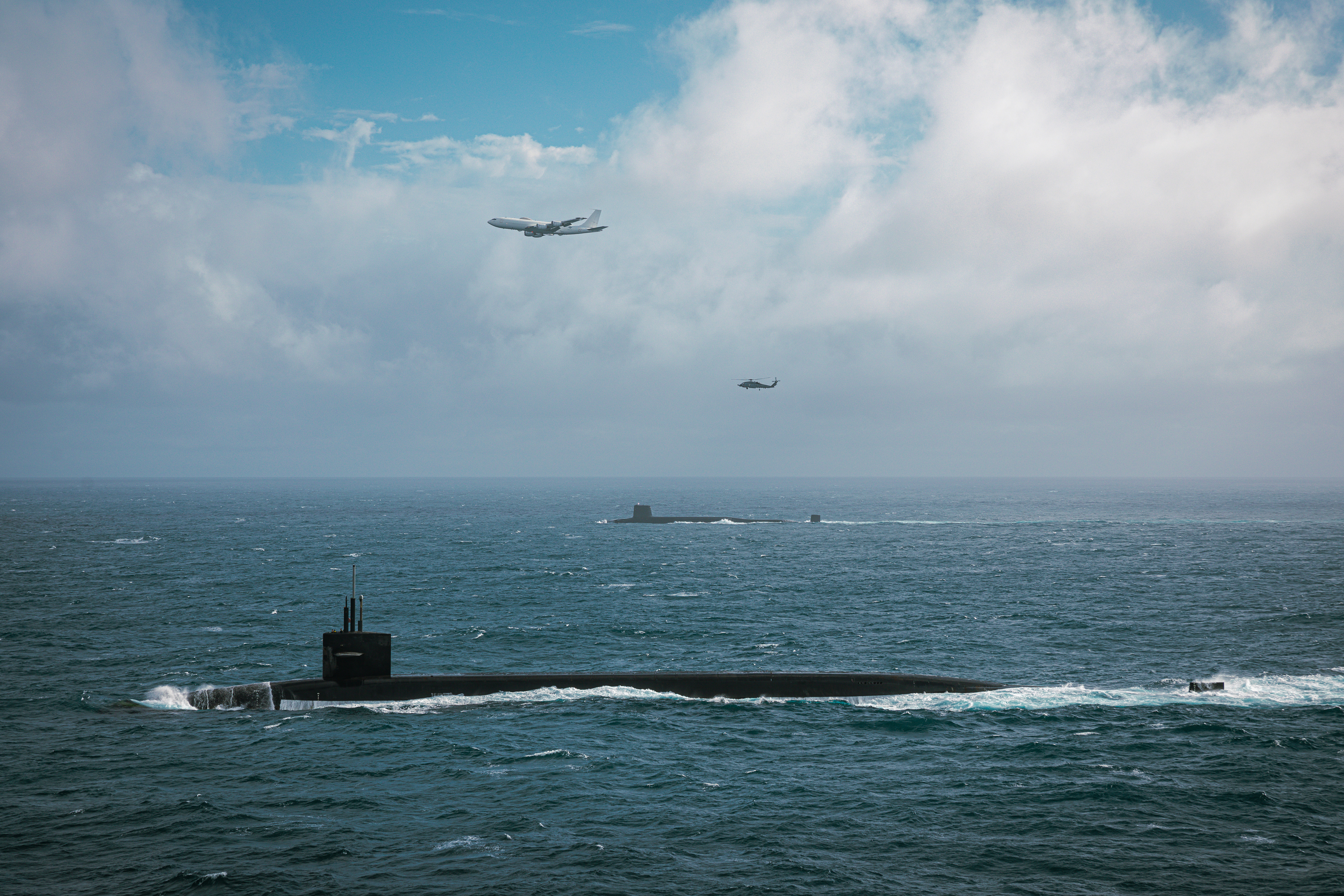 U.S. Navy Ohio-class ballistic missile submarine USS Tennessee (SSBN 734), an United Kingdom Royal Navy Vanguard-class nuclear submarine, an E6-B Mercury assigned to the "Shadows" of Fleet Air Reconnaissance Squadron (VQ) 4 and an MH60R Sea Hawk helicopter attached to the “Proud Warriors” of Helicopter Maritime Strike Squadron (HSM) 72 conducted bi-lateral at sea training designed to validate tactics, techniques, and procedures which strengthens the relationship between uniquely close Allies in support of deterrence and collective security.