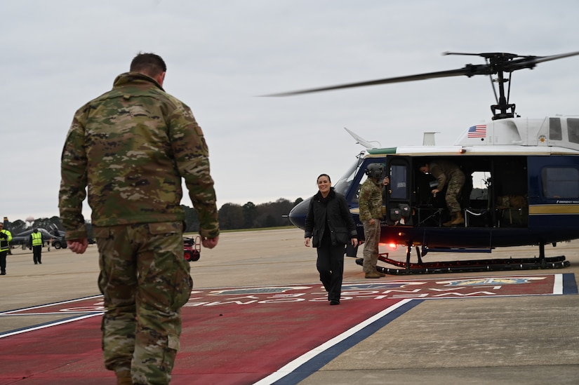 Under Secretary of the Air Force Gina Ortiz Jones departs the helicopter at JBLE.