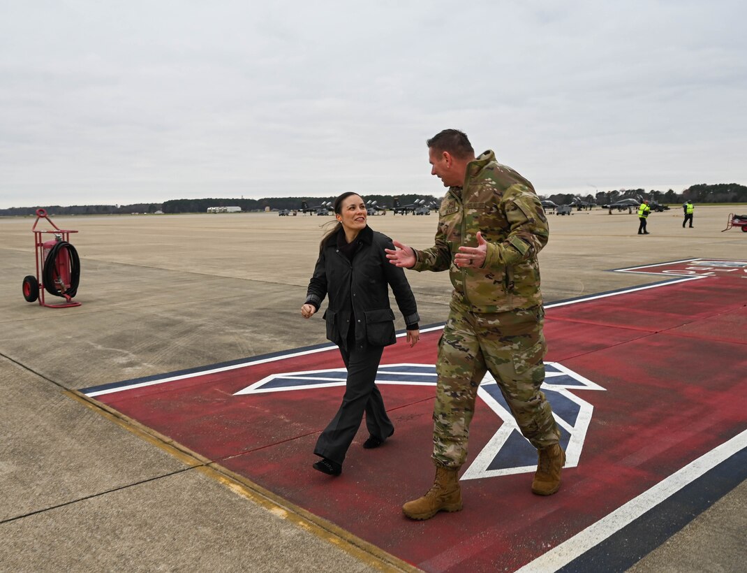 Under Secretary of the Air Force Gina Ortiz Jones is greeted by Col. Gregory Beaulieu.