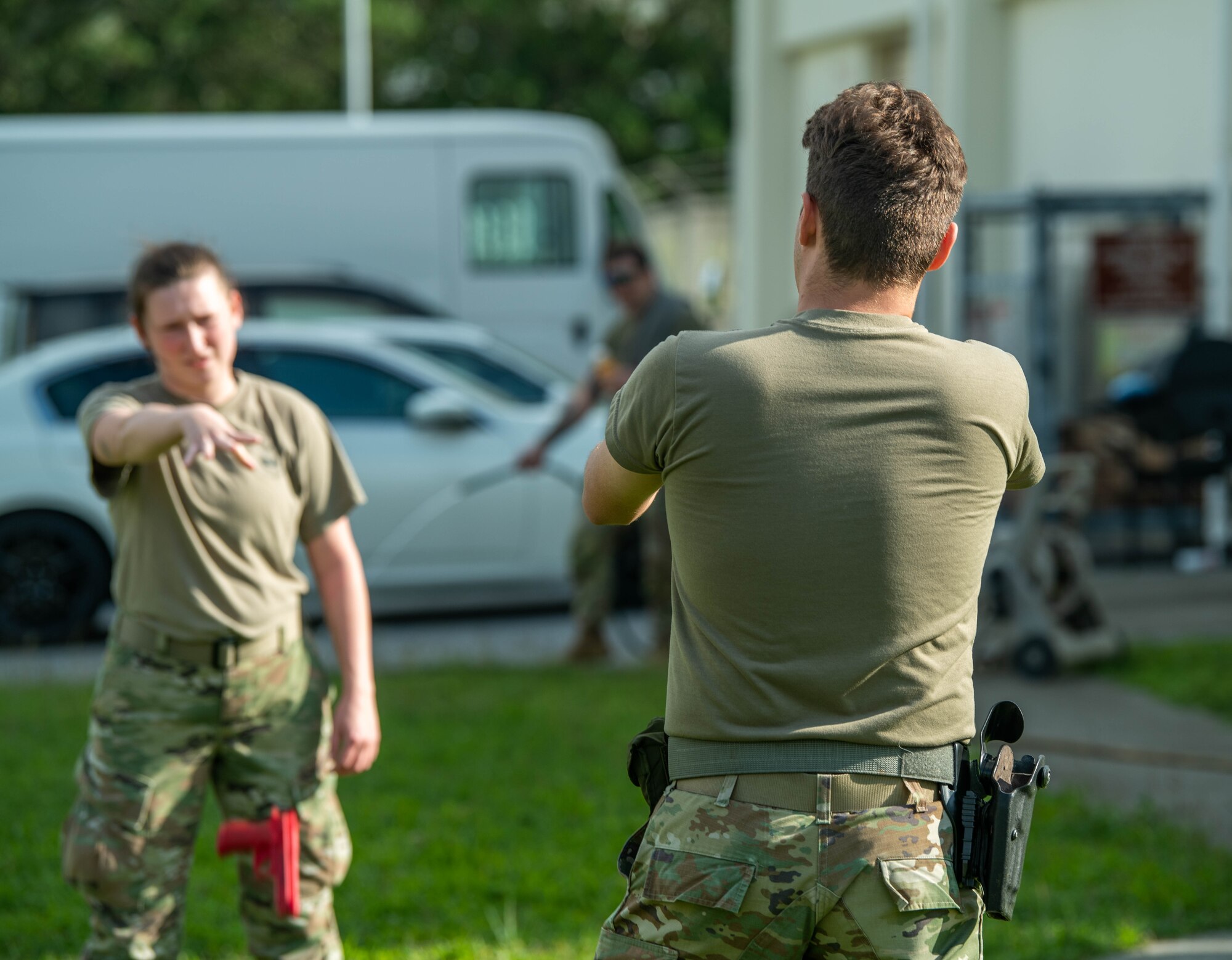 Defenders simulate a hostile situation.