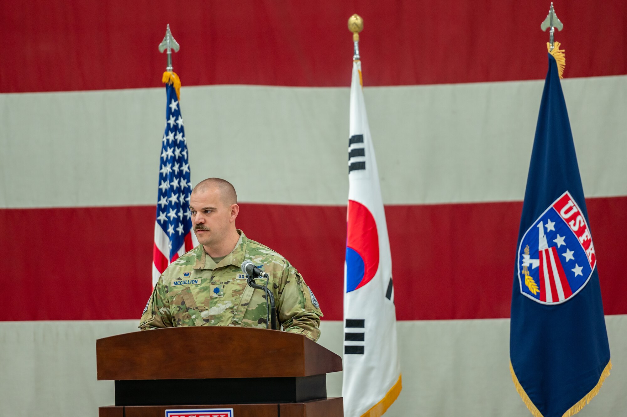 U.S. Space Force Lt. Col. Joshua McCullion, U.S. Space Forces Korea inaugural commander, gives closing remarks during the USSFK activation ceremony at Osan Air Base, Republic of Korea, Dec. 14, 2022.