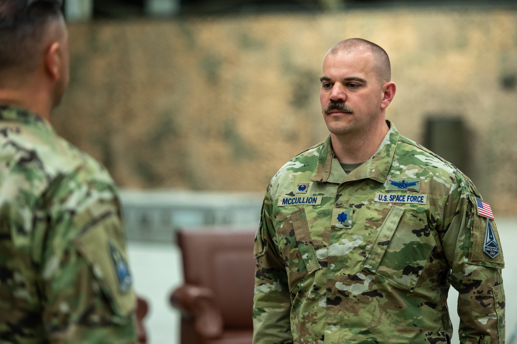 U.S. Space Force Lt. Col. Joshua McCullion, U.S. Space Forces Korea inaugural commander, stands at attention while waiting to receive the USSFK guidon during the unit’s activation ceremony at Osan Air Base, Republic of Korea, Dec. 14, 2022.