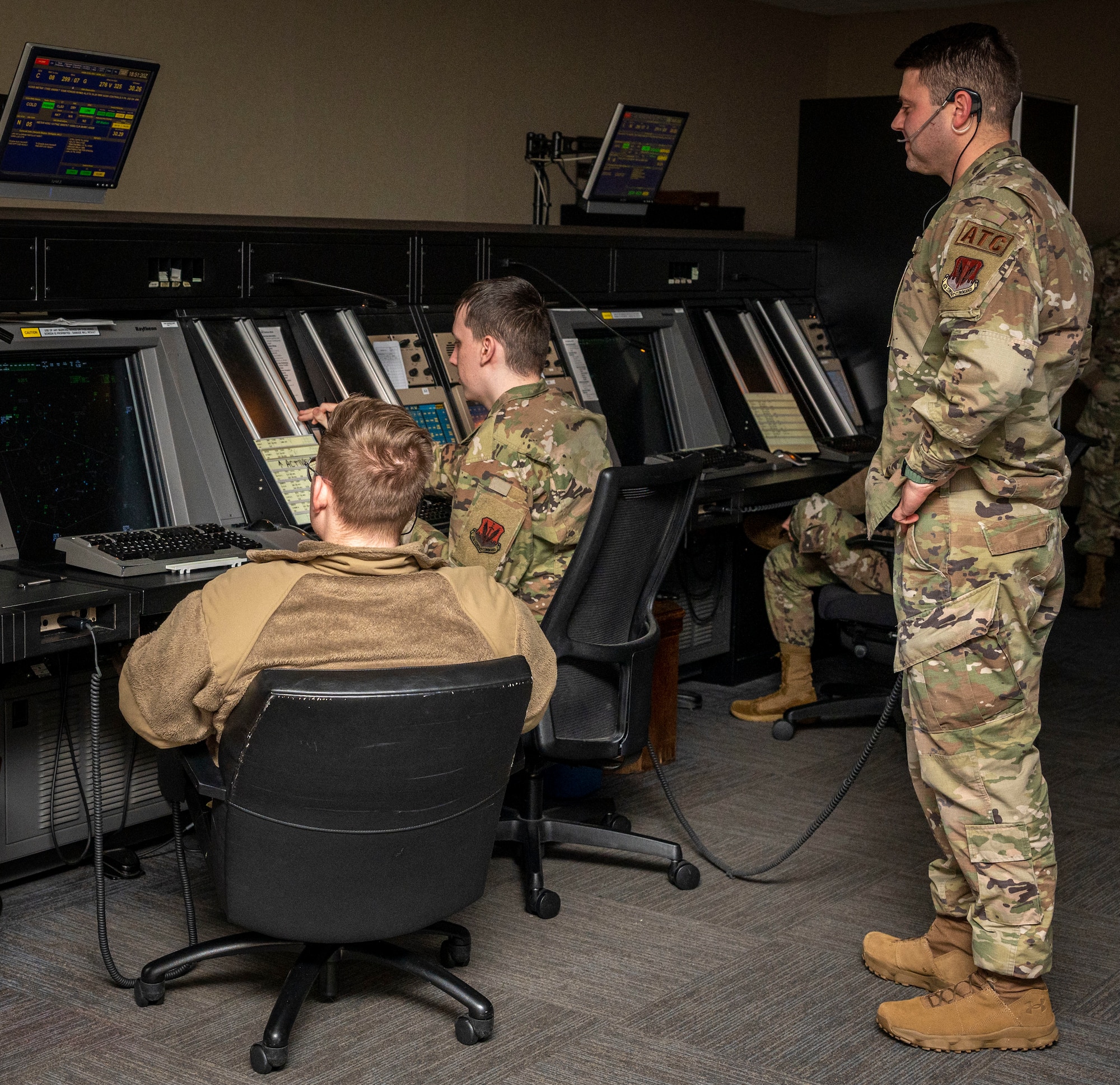 Airmen assigned to the 4th Operations Support Squadron Radar Approach Control train to ensure aircrew are safe at Seymour Johnson Air Force Base, North Carolina, Dec. 13, 2022. The 4th OSS RAPCON Airmen train to provide effective communication and reliable information to aviators to keep them safe. (U.S. Air Force photo by Airman 1st Class Sabrina Fuller)