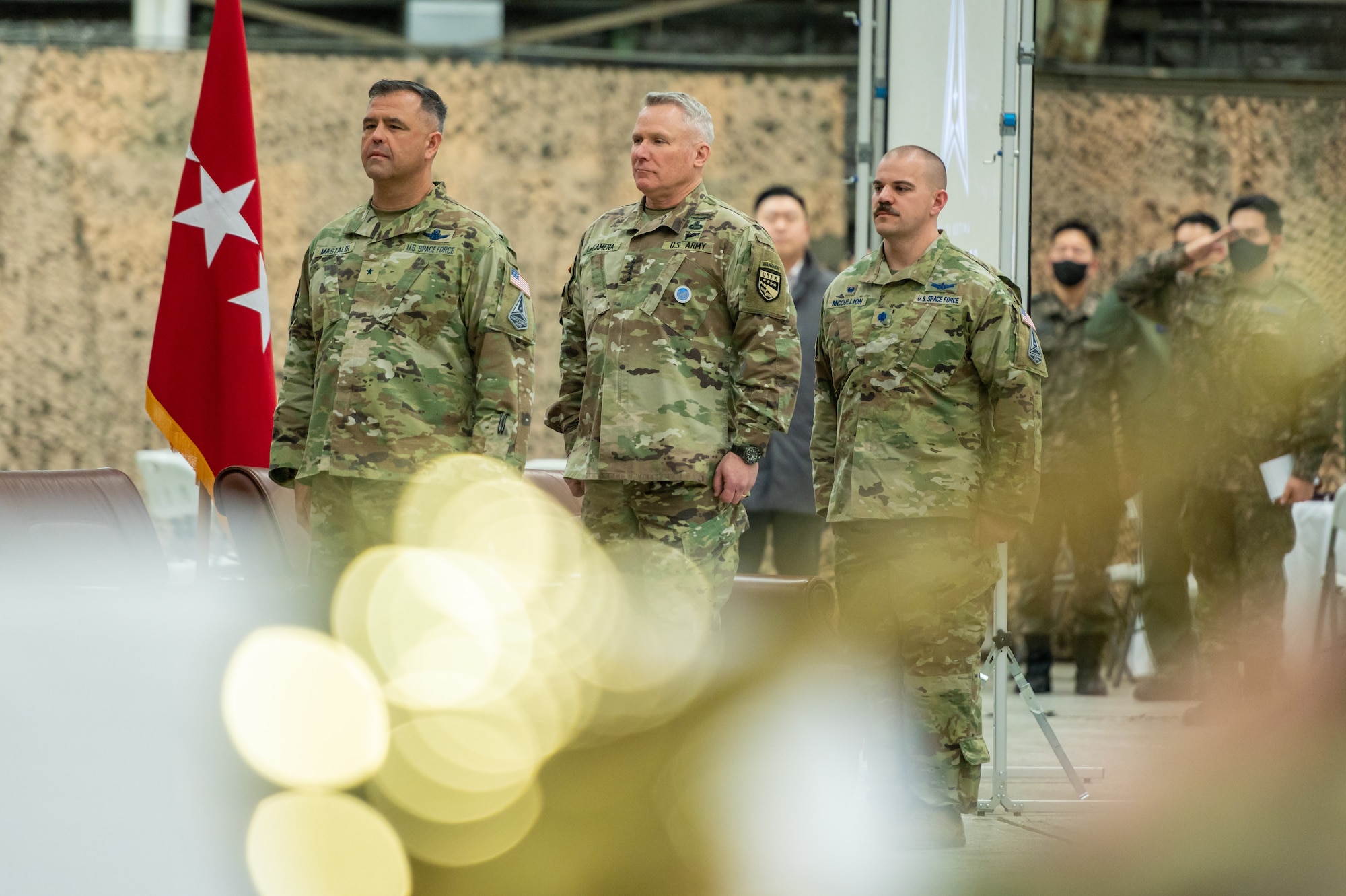 (From left) U.S. Space Force Brig. Gen. Anthony Mastalir, U.S. Space Forces Indo-Pacific Command commander, U.S. Army Gen. Paul LaCamera, U.S. Forces Korea commander, and USSF Lt. Col. Joshua McCullion, U.S. Space Forces Korea inaugural commander, stand at attention during the USSFK activation ceremony at Osan Air Base, Republic of Korea, Dec. 14, 2022.