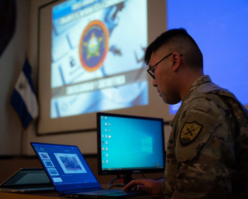 Sergeant Adam Dorian Wong, threat researcher with 136th Cybersecurity Unit, presents new topics of interest including artificial intelligence and vulnerability identification to Salvadoran cyber security unit in El Salvador, December 7, 2022 (U.S. Air National Guard/Victoria Nelson)