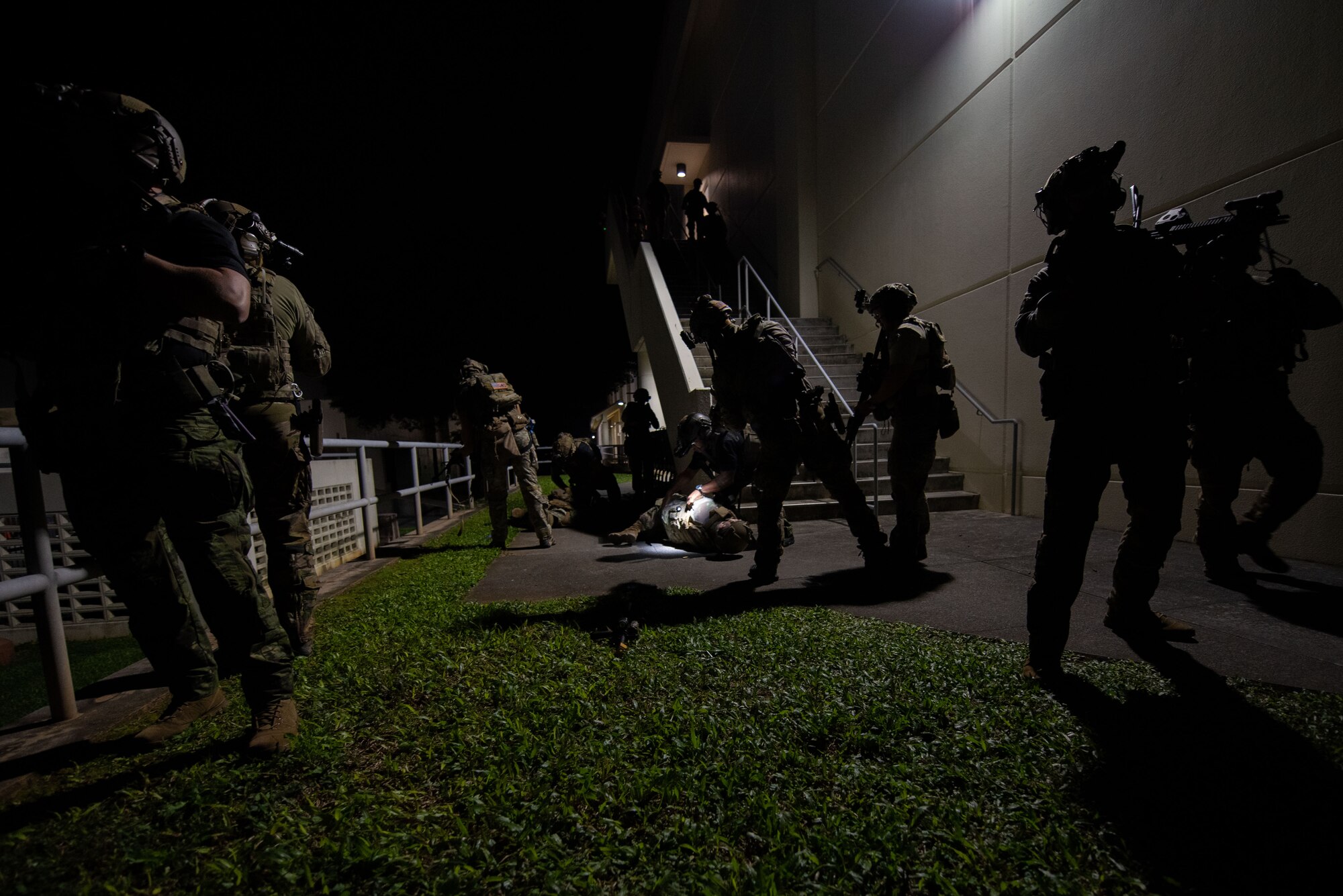 Soldiers apprehend a simulated shooter.