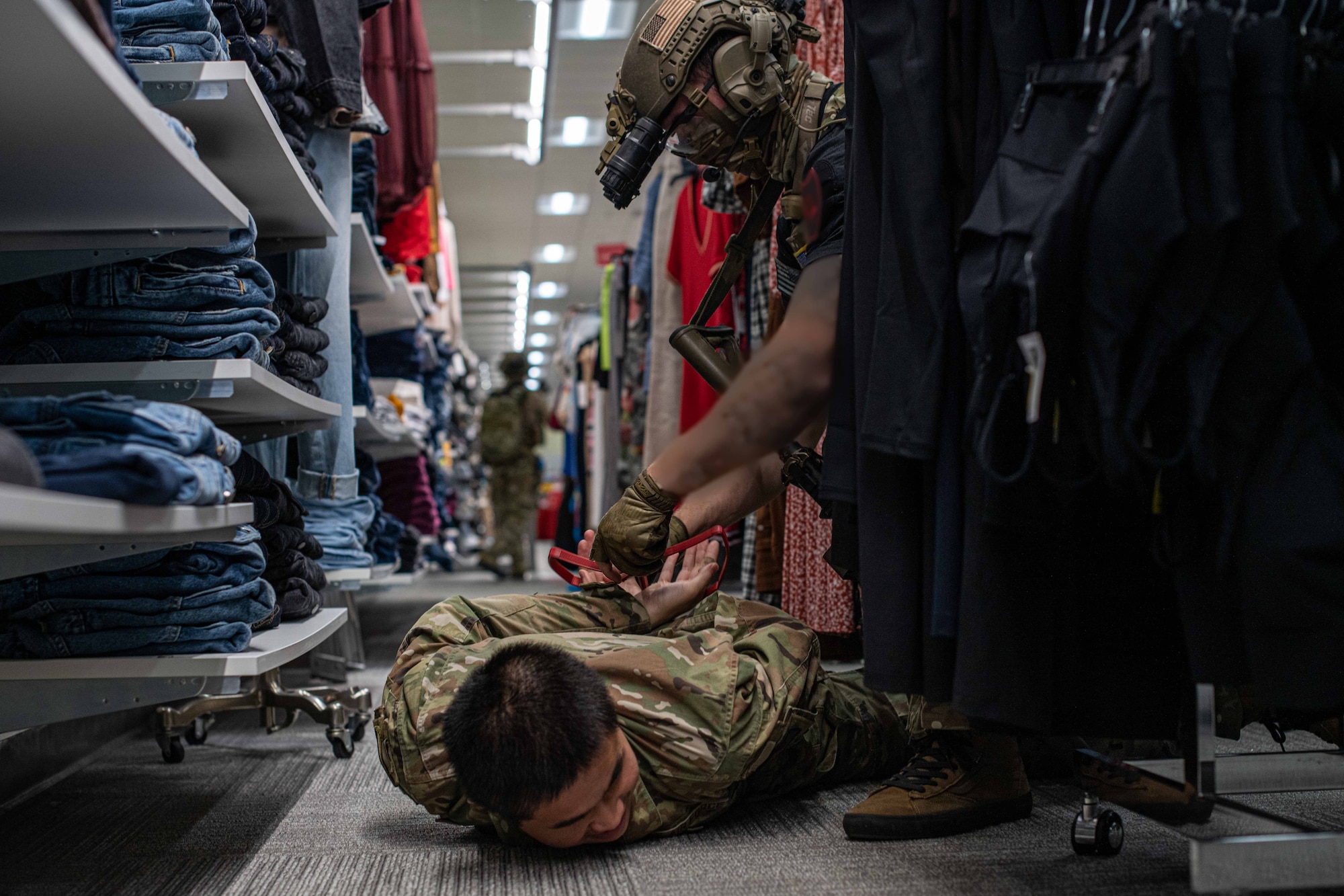 A Soldier and Airman conduct an active shooter exercise.