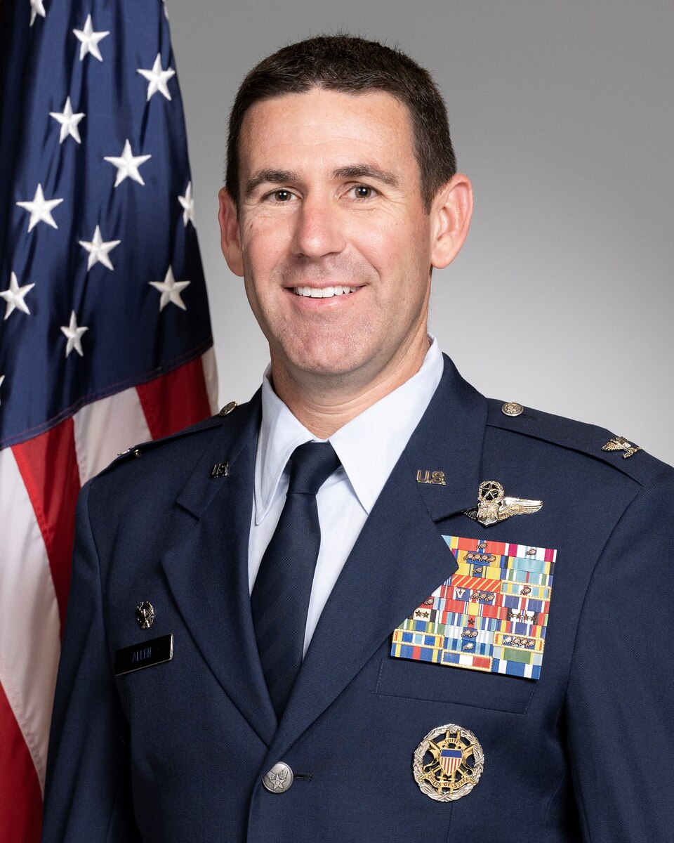 U.S. Air Force Col. Jason Allen, 81st Training Wing commander, poses for an official photo at Wall Studio on Keesler Air Force Base, Mississippi, Dec. 14, 2022.
