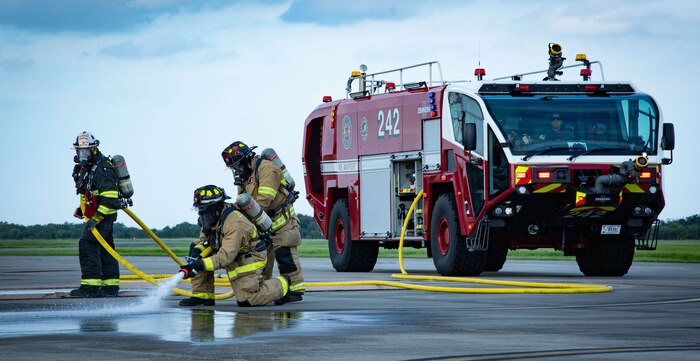 Naval Station Mayport Fire and Emergency Services respond to an aircraft mishap drill during a joint training exercise between base fire and emergency services and Helicopter Maritime Strike Squadrons (HSM) 48 and 50 at Naval Station Mayport, Florida, Sept. 15, 2022.