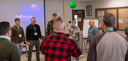 Members of the Illinois National Guard who attended the Operational Stress Management and Resiliency Care for First Responders course at Camp Lincoln, Springfield, were divided into teams and participated in hands-on exercises designed to teach stress-coping mechanisms.