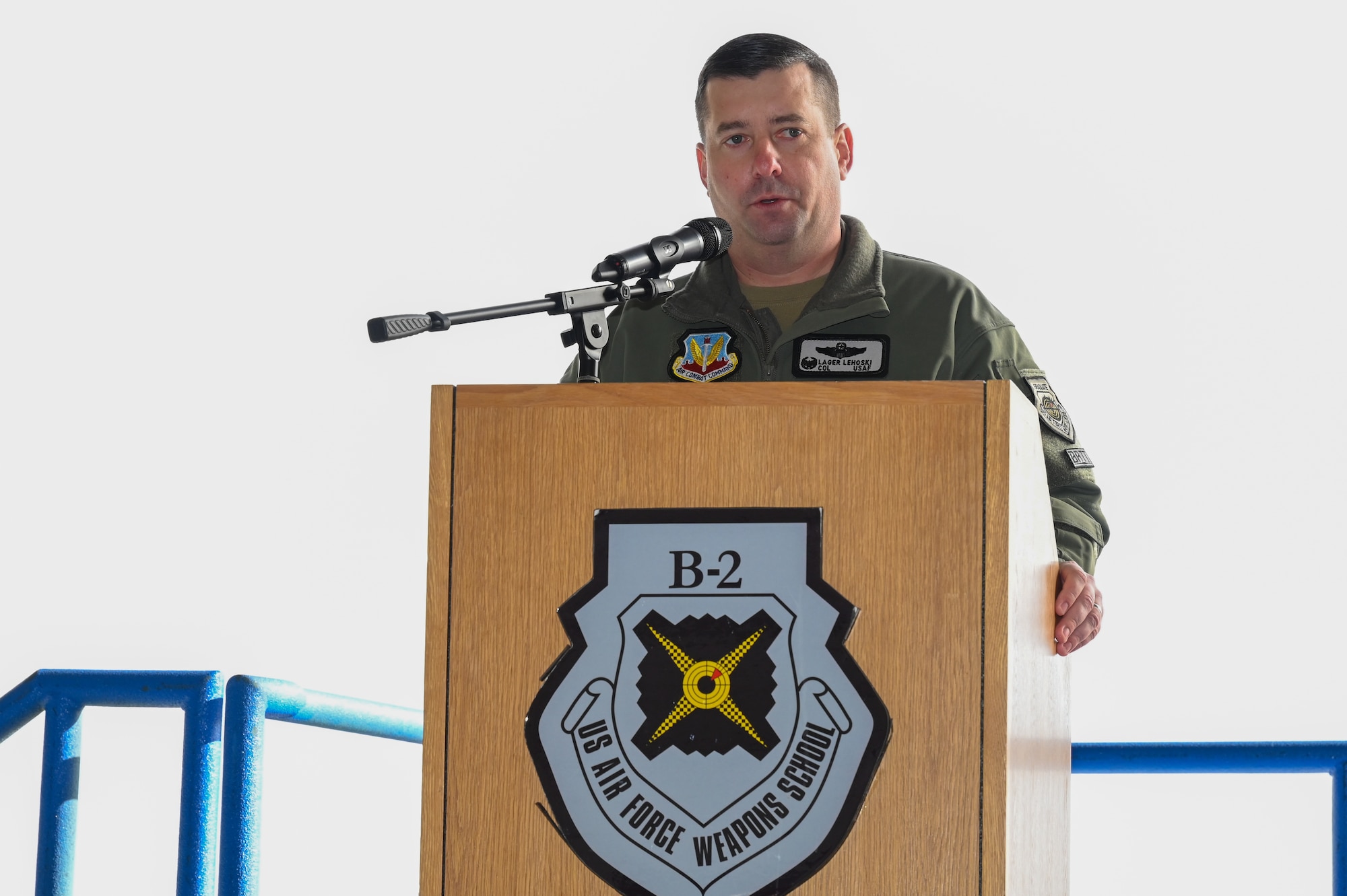 Col. Daniel Lehoski, United States Air Force Weapons School Commandant, speaks during a change of command at Whiteman Air Force Base, Missouri, December 14, 2022. Change of commands are a tradition dating back hundreds of years, with the U.S. Air Force adopting it from the U.S. Army. (U.S. Air Force photo by Airman 1st Class Joseph Garcia)