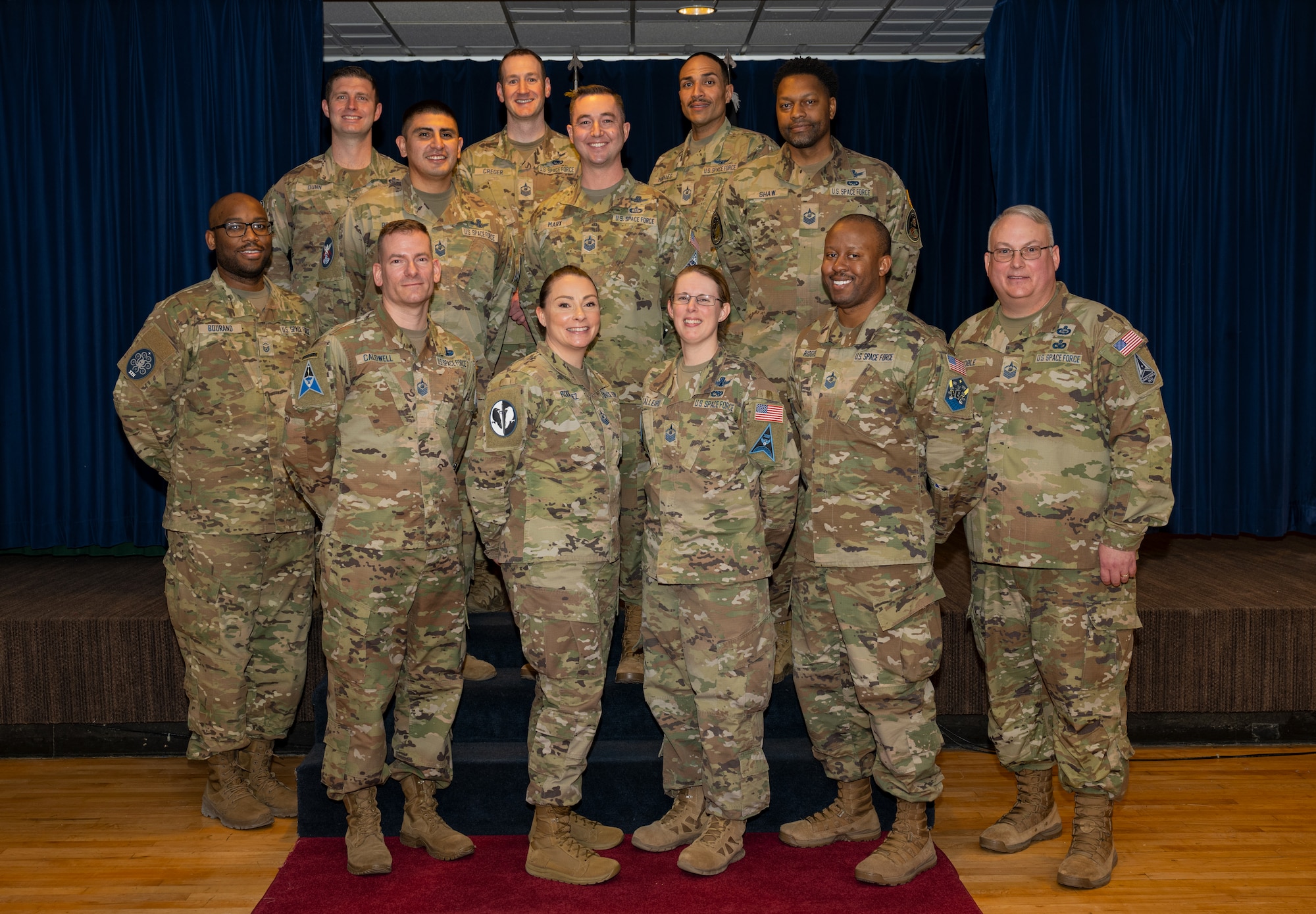 Newly selected senior master sergeants pose for a group photo