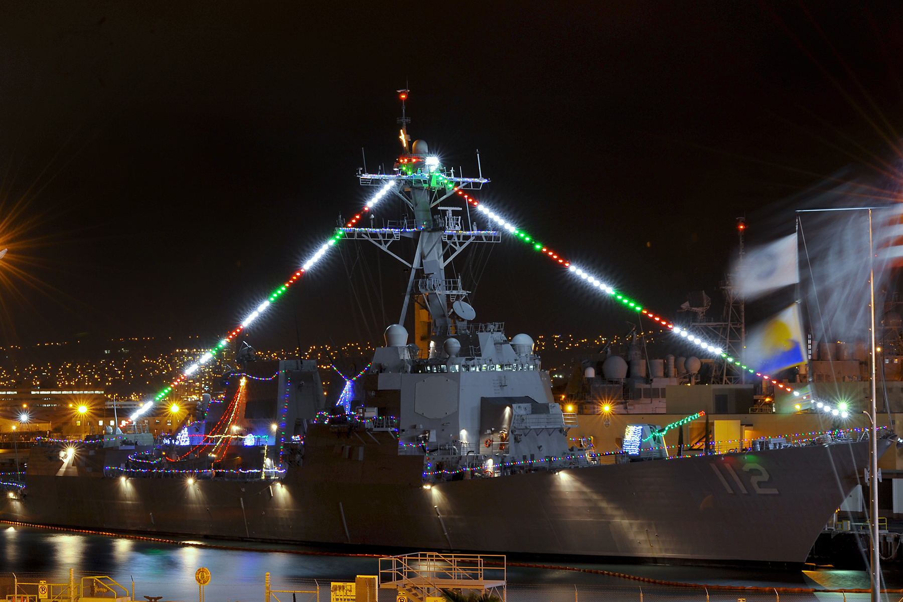 U.S. Navy ship is decorated with holiday lights