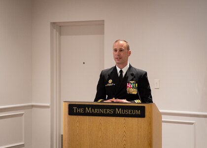 Cmdr. Jonathan Ahlstrom speaks during a change of command ceremony for the Los Angeles-class fast attack submarine USS Columbus (SSN 762) at Mariners’ Museum and Park in Newport News, Va., Dec. 14.