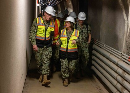 Joint Task Force Red Hill Commander Vice Adm. John Wade speaks with Vice Chief of Naval Operations Adm. Lisa M. Franchetti during a site visit to the Red Hill Bulk Fuel Storage Facility.