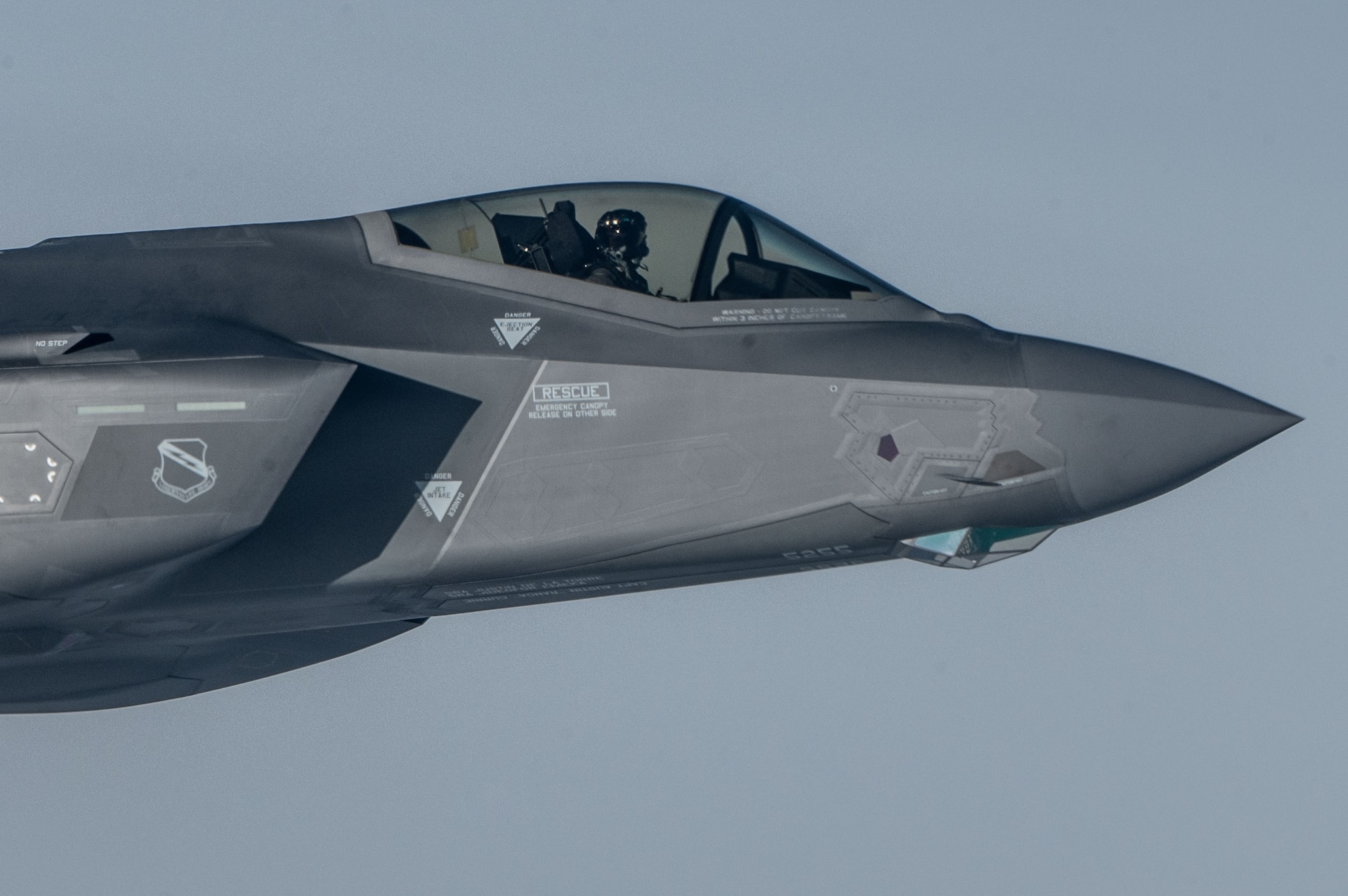 A U.S. Air Force F-35 Lightning II from Hill Air Force Base flies in formation with a KC-135 Stratotanker from Fairchild Air Force Base during an air refueling mission, Dec. 12, 2022. Fairchild provided air refueling support, during a training mission to extend the reach of the F-35 crews. (U.S. Air Force photo by Airman 1st Class Stassney Davis)