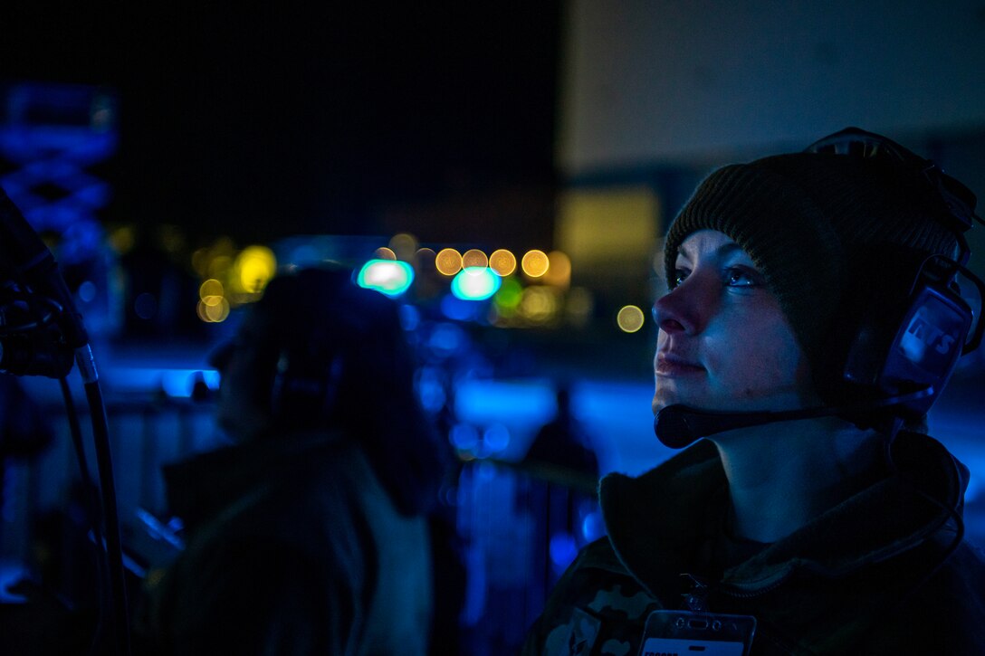 U.S. Air Force Senior Airman Brittney Manchester, 2d Audiovisual Squadron visual production specialist, films for a practice run of the B-21 Raider unveiling ceremony at Northrop Grumman’s manufacturing facility on Air Force Plant 42 in Palmdale, California, Dec. 1, 2022.