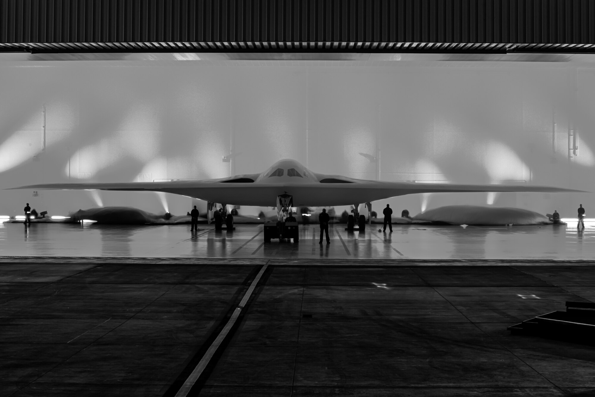 A B-21 Raider is unveiled at Northrop Grumman’s manufacturing facility on Air Force Plant 42 in Palmdale, California, Dec. 2, 2022.