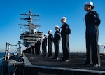 Sailors man the rails as the U.S. Navy’s only forward-deployed aircraft carrier, USS Ronald Reagan (CVN 76), returns to Commander, Fleet Activities Yokosuka, Japan, following its deployment to the western Pacific ocean, Dec. 16. During Ronald Reagan’s deployment, the ship conducted joint Carrier Strike Group (CSG) exercises with the Republic of Korea Navy, participated in multinational exercises with the Japan Maritime Self-Defense Force and Royal Australian Navy during Valiant Shield, Keen Sword and Malabar 2022 and visited the Philippines, Singapore, Korea and Guam. Ronald Reagan, the flagship of CSG 5, provides a combat-ready force that protects and defends the United States, and supports Alliances, partnerships and collective maritime interests in the Indo-Pacific region.