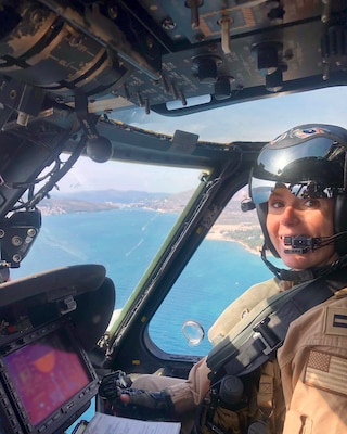 Lt. Molly McGuckin, assigned to Helicopter Sea Combat Squadron (HSC) 5, poses for a photo inside an MH-60S Knighthawk helicopter, Nov. 5, 2022. Carrier Air Wing (CVW) 7 is the offensive air and strike component of Carrier Strike Group (CSG) 10, George H.W. Bush CSG. The squadrons of CVW-7 are Strike Fighter Squadron (VFA) 86, VFA-103, VFA-136, VFA-143, Electronic Attack Squadron (VAQ) 140, Carrier Airborne Early Warning Squadron (VAW) 121, HSC-5, and Helicopter Maritime Strike Squadron (HSM) 46. The George H.W. Bush CSG is on a scheduled deployment in the U.S. Naval Forces Europe area of operations, employed by U.S. Sixth Fleet to defend U.S., allied, and partner interests.