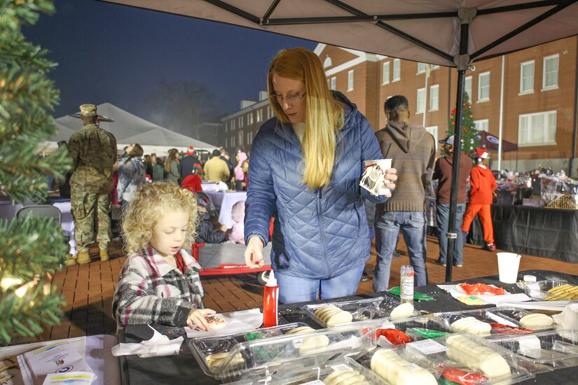 An Army family decorates cookies