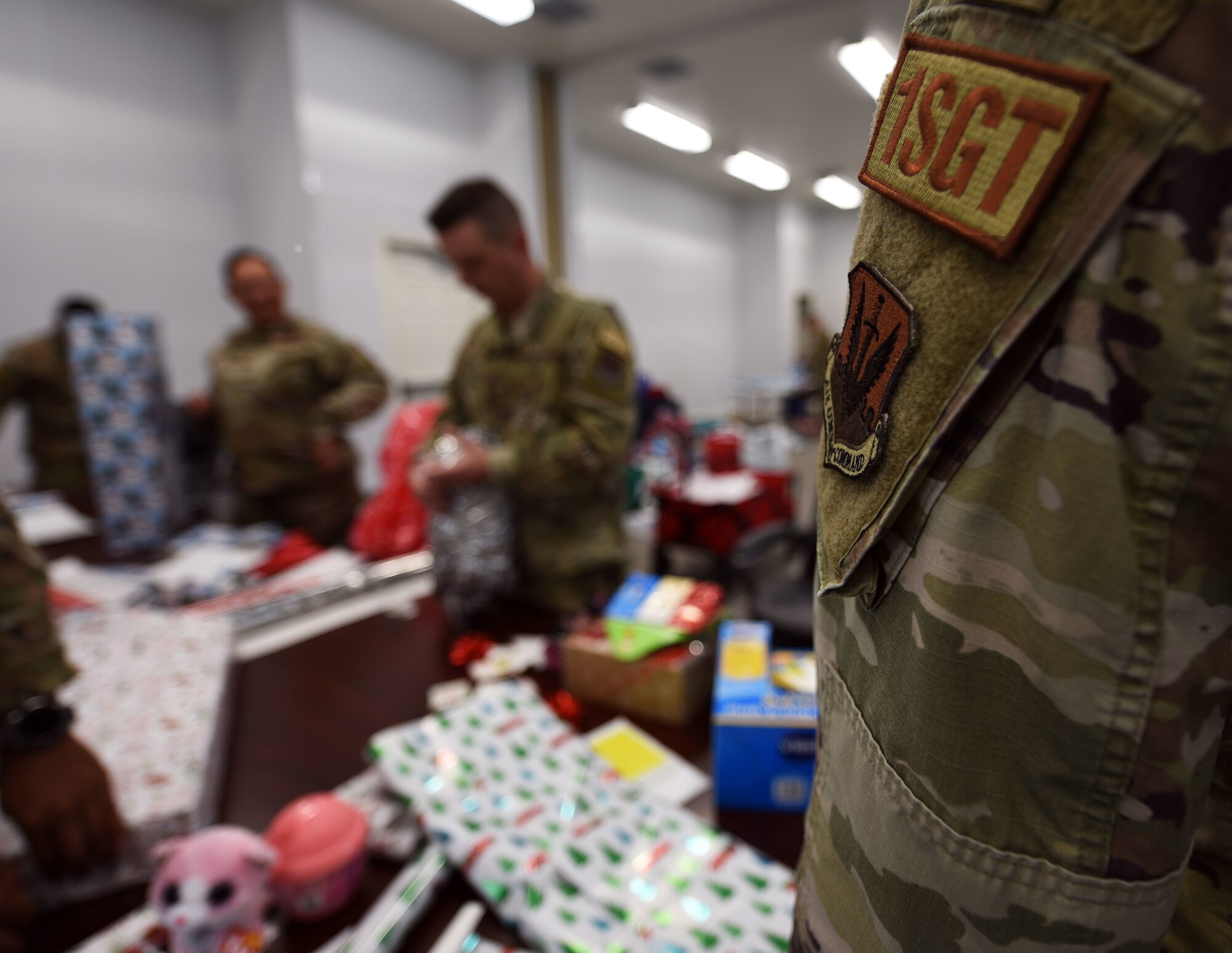 Airmen wrap holiday gifts