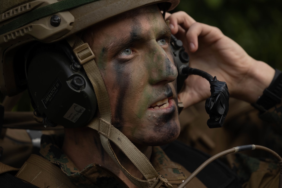 U.S. Marine Corps Cpl. Isaac Eyler, a joint terminal attack controller with 3rd Battalion, 12th Marines, communicates with an inbound aircraft during Stand-in Force Exercise on Okinawa, Japan, Dec. 6, 2022. SiF-EX is a Division-level exercise involving all elements of the Marine Air-Ground Task Force focused on strengthening multi-domain awareness, maneuver, and fires across a distributed maritime environment. This exercise serves as a rehearsal for rapidly projecting combat power in defense of allies and partners in the region.