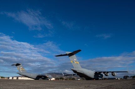 Airmen prepare to launch two C-17 Globemaster IIIs