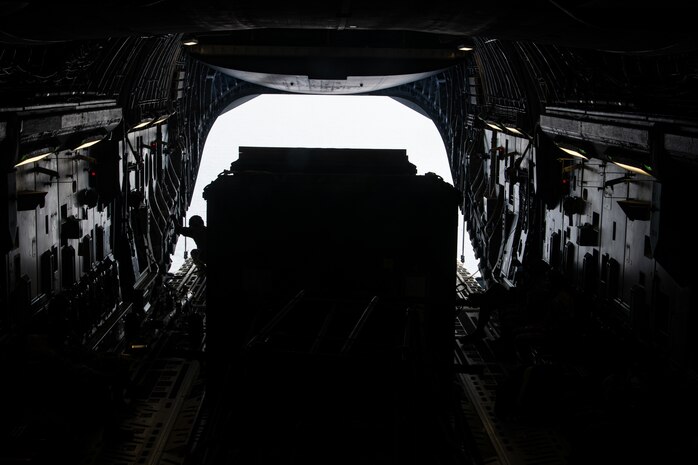 U.S. Airmen in a C-17 Globemaster III simulate an aerial drop over Saipan