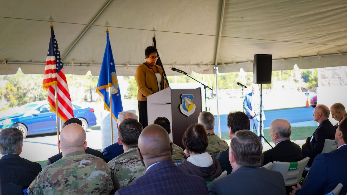 Segrid Harris, deputy director of the Air Force Research Laboratory’s Munitions Directorate, delivers remarks at the directorate’s dedication and ribbon-cutting ceremony for the lab’s newly constructed Advanced Munitions Technology Complex, or AMTC, at Eglin Air Force Base, Florida, Dec. 15, 2022. This military construction project, worth approximately $165 million, provides new test capability and modernizes much of the outdated 1960s infrastructure. AFRL designed the AMTC as a modern, collaborative research space that gives scientists and engineers the ability to experiment with new explosive materials and integrate them into complex munition designs. (U.S. Air Force photo / Keith Lewis)