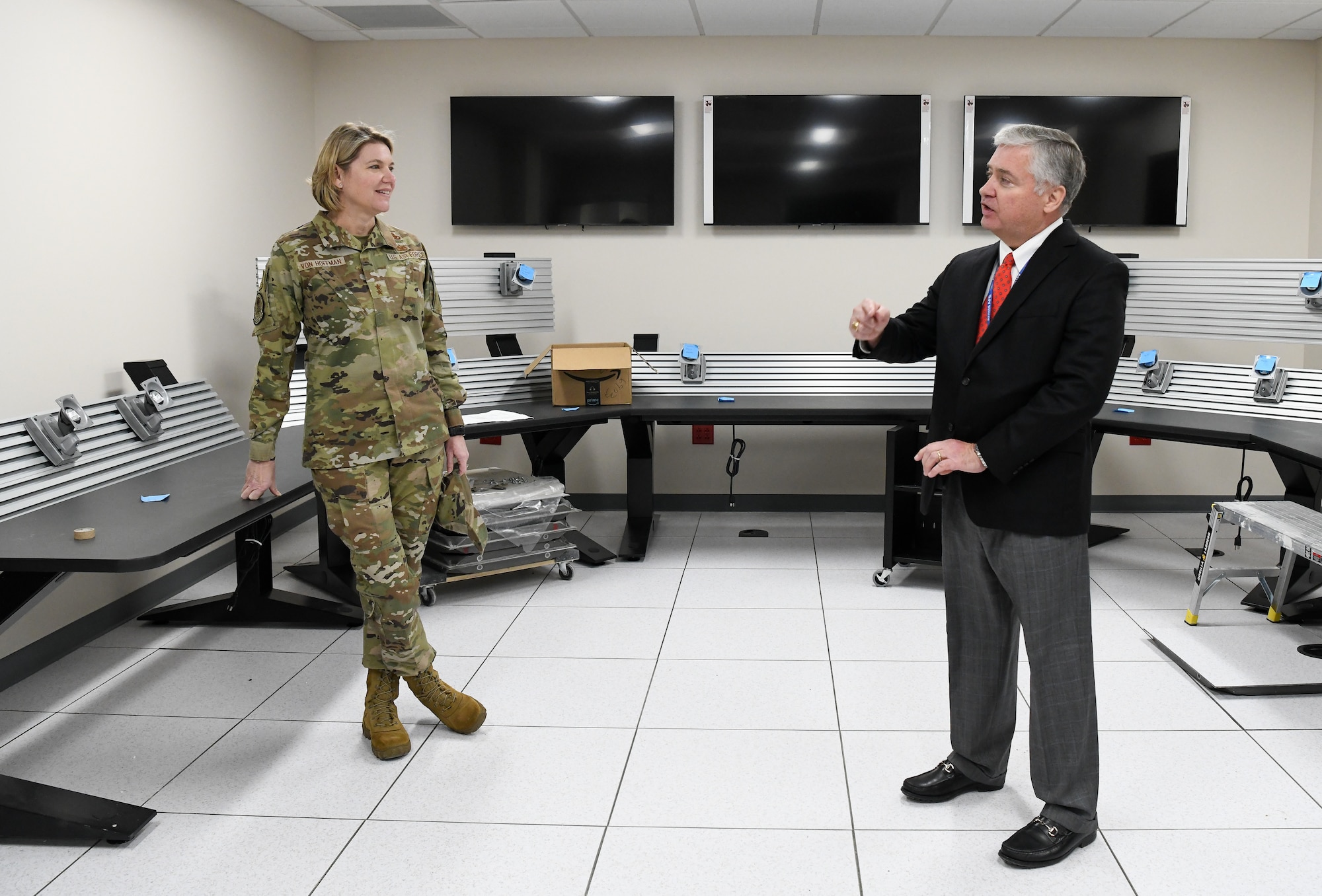 Air Force officer speaking with a civilian