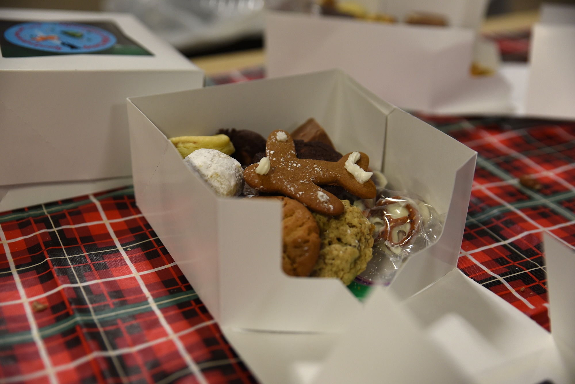 The Team McChord community donated homemade cookies for Operation Cookie Drop at Joint Base Lewis-McChord, Washington, Dec. 14, 2022. Over 700 single Airmen received cookies during Operation Cookie Drop this year. (U.S. Air Force photo by Airman Kylee Tyus)
