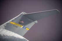 A U.S. Air Force Globemaster III prepares to take off