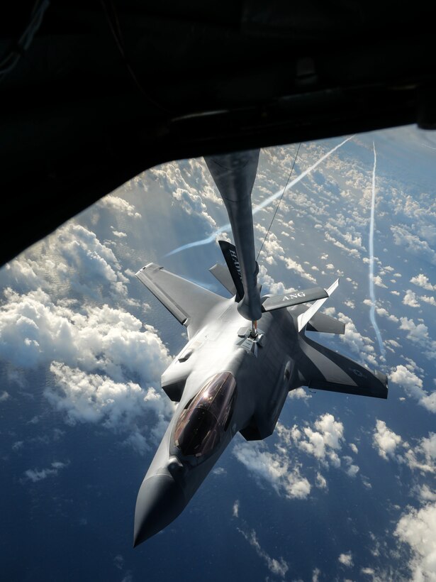 A U.S. Air Force F-35A Lightning II from the 65th Aggressor Squadron receives fuel from a KC-135 Stratotanker from the 203rd Air Refueling Squadron December 8, 2022, near the coast of Oahu, Hawaii.