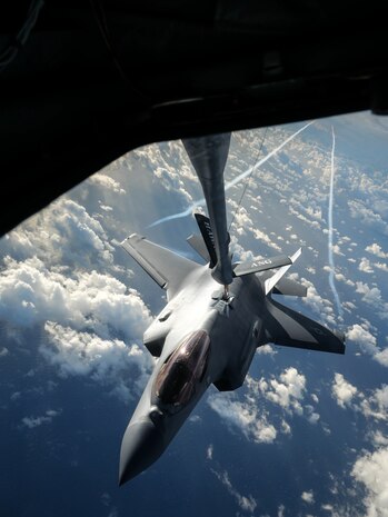A U.S. Air Force F-35A Lightning II from the 65th Aggressor Squadron receives fuel from a KC-135 Stratotanker from the 203rd Air Refueling Squadron December 8, 2022, near the coast of Oahu, Hawaii.
