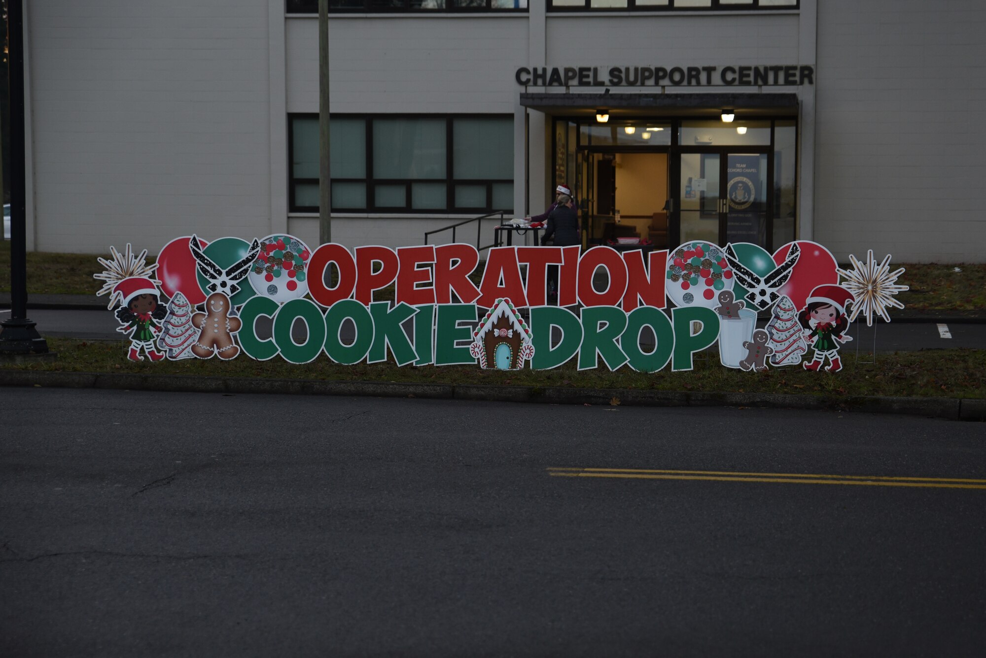 Operation Cookie Drop is an annual tradition where homemade cookies are distributed to single Airmen at Joint Base Lewis-McChord, Washington, Dec. 14, 2022. Over 700 single Airmen received cookies during Operation Cookie Drop this year. (U.S. Air Force photo by Airman Kylee Tyus)