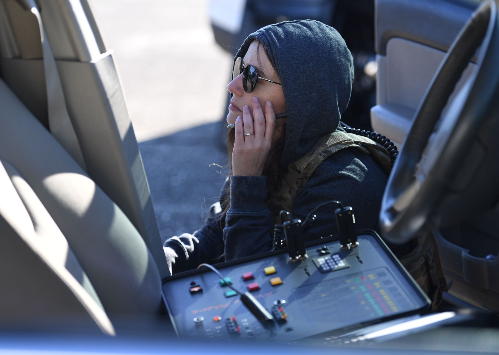 U.S. Air Force Tech. Sgt. Kayla Rykowski, 81st Security Forces Squadron chief of detectives, prepares to negotiate with the "hijacker" during a hijacking exercise at Keesler Air Force Base, Mississippi, Dec. 15, 2022.