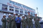 PEARL HARBOR, Hawaii (December 14, 2022) Vice Chief of Naval Operations Admiral Lisa Franchetti meets with a shipyard worker at Pearl Harbor Naval Shipyard & Intermediate Maintenance Facility (PHNSY & IMF) during a visit for an operations update and Shipyard Infrastructure Optimization Program (SIOP) tour onboard Joint Base Pearl Harbor-Hickam.