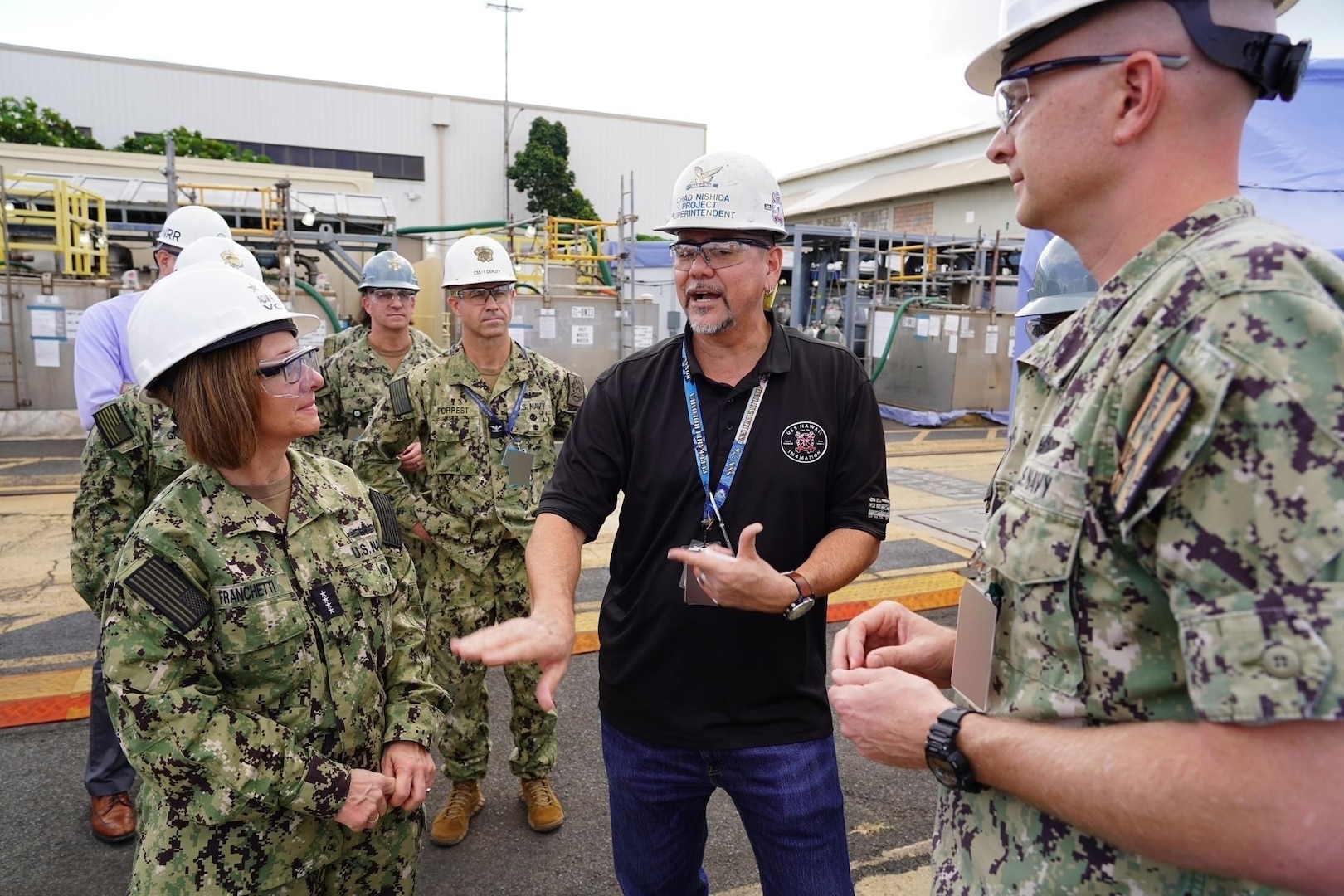 PEARL HARBOR, Hawaii (December 14, 2022) Vice Chief of Naval Operations Admiral Lisa Franchetti meets with a shipyard worker at Pearl Harbor Naval Shipyard & Intermediate Maintenance Facility (PHNSY & IMF) during a visit for an operations update and Shipyard Infrastructure Optimization Program (SIOP) tour onboard Joint Base Pearl Harbor-Hickam.