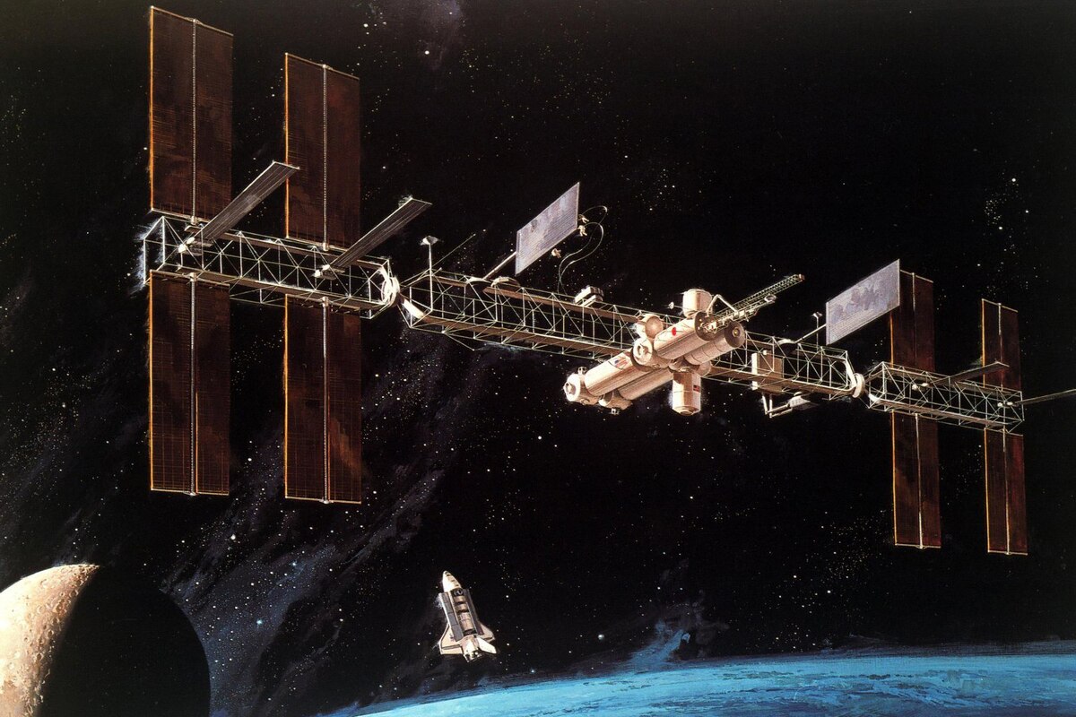 A satellite orbits above a planet.