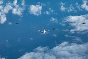 U.S. and Royal Australian Air Force aircraft converge in a bilateral formation Dec. 8, 2022, near the coast of Oahu, Hawaii, during exercise Pacific Edge 23. The exercise provided realistic combat training to increase readiness and stability throughout the Indo-Pacific.