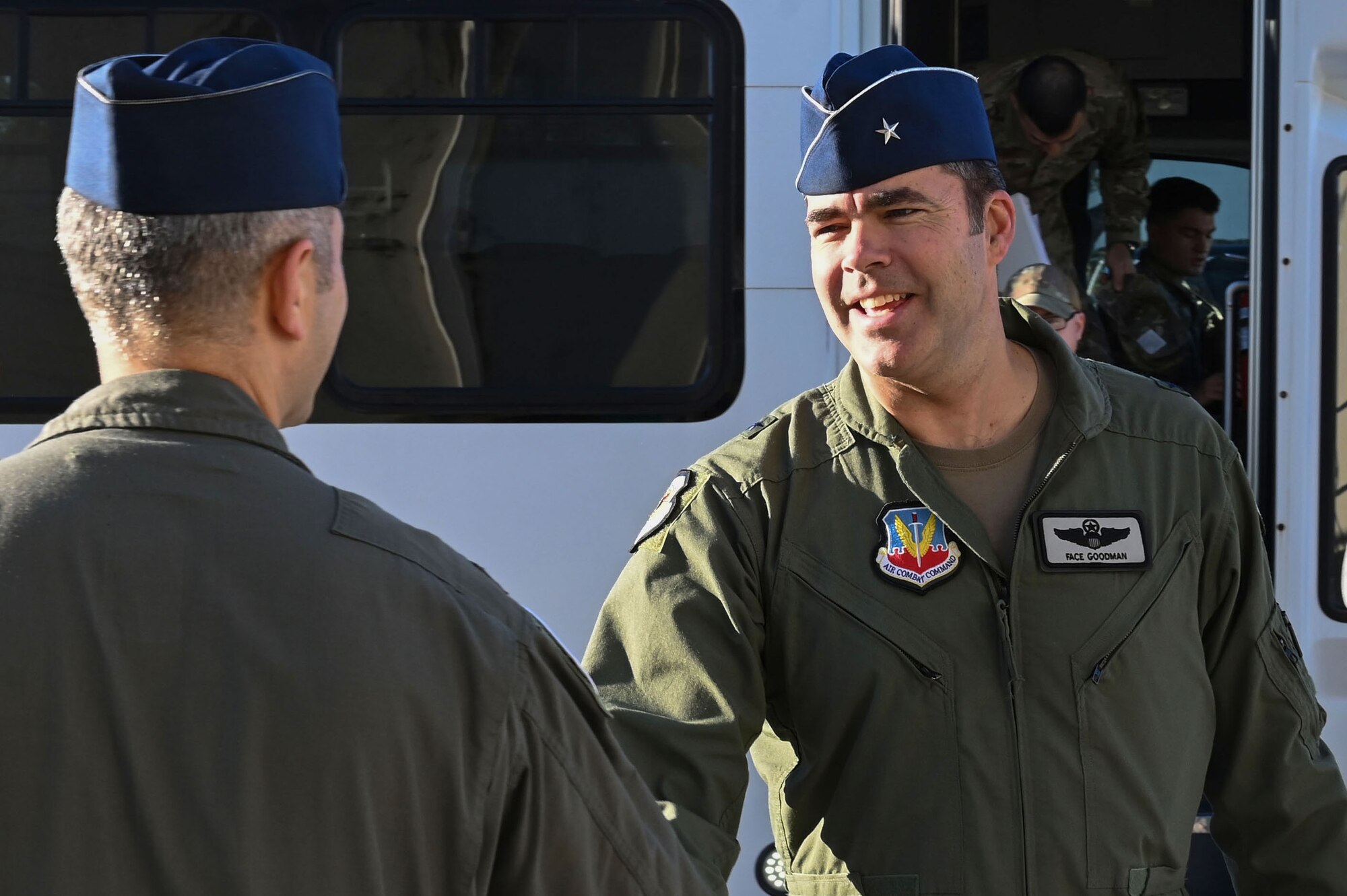 U.S. Air Force Col. Robert Cocke, 350th Spectrum Warfare Group commander, left, Col. Josh Koslov, 350th Spectrum Warfare Wing  commander, center left, Brig. Gen. Richard Goodman, 57th Wing commander, center right, and Col. John Paul Mintz, 850th Spectrum Warfare Group commander, right, pose for a photo at Eglin Air Force Base, Fla., Dec. 16, 2022. The 350th SWW’s mission is to develop and employ evolutionary, cutting-edge capabilities for warfighters that will make decisive impacts in battle, achieving commanders’ objectives and allowing warfighters to beat pacing competitors across the spectrum. (U.S. Air Force photo by Staff Sgt. Ericka A. Woolever)