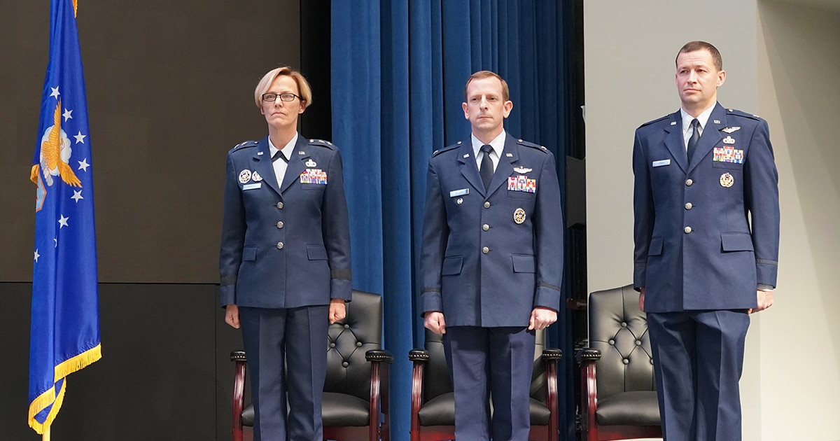Air Force Research Laboratory, or AFRL, Commander Maj. Gen. Heather Pringle, left, participates in a change of leadership ceremony with Col. Nathan Diller, center, and Col. Elliott Leigh, right, Dec. 15, 2022, at the Air Force Institute of Technology, Wright-Patterson Air Force Base, Ohio. Leigh assumed the role of AFWERX director from Diller. AFWERX is an AFRL directorate and the Department of the Air Force’s innovation arm. (U.S. Air Force photo / Michael Madero)