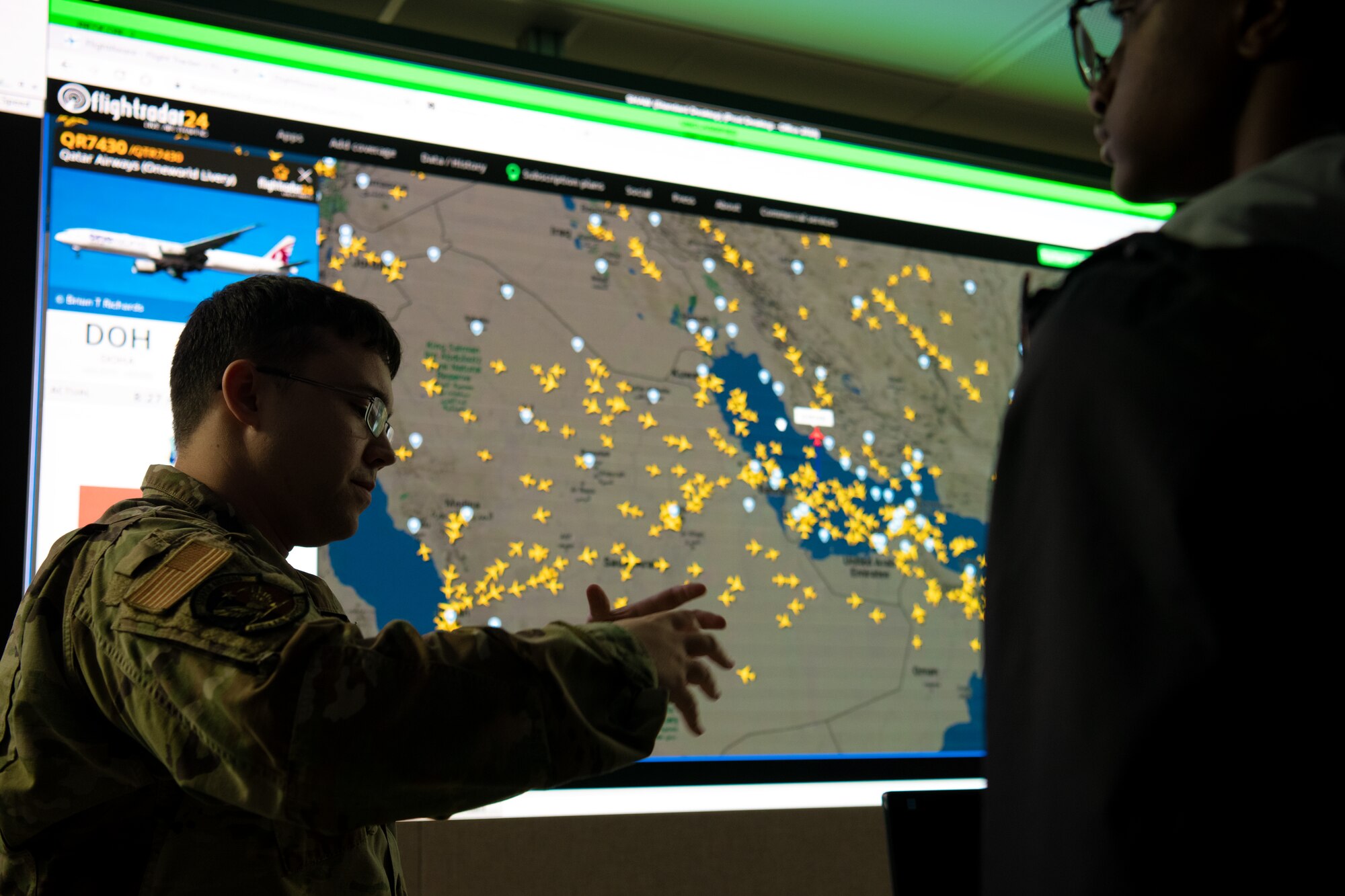 U.S. Air Force Tech. Sgt. Mark Wiggin, 609th Air Operations Center Joint Interface Control Cell non-commissioned officer in charge, describes the U.S. Central Command air picture to Florence 1 School District’s Advantage Academy students at Shaw Air Force Base, S.C., Nov. 30, 2022. Units from Ninth Air Force (Air Forces Central), 15th Air Force and the 20th Fighter Wing worked together to host an engagement for 35 local high school students as part of Project Quesada. The new Air Combat Command-led program is designed to attract and recruit talented students seeking careers in aviation, science, technology, engineering and math in an effort to develop future aviators and leaders.