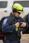 Anthony Burton, a firefighter with Utah Task Force 1, prepares to conduct a training exercise with his team during a Utah National Guard FEMA Region VIII Homeland Response Force training exercise on Camp WIlliams, Utah, Nov. 5, 2022. The event featured multiagency interoperability training for the Utah National Guard and civilian partner agencies to provide initial and follow-on care to stranded and injured citizens in the event of a natural or human-caused emergency. (U.S. Army National Guard photo by Sgt. Alejandro Lucero)