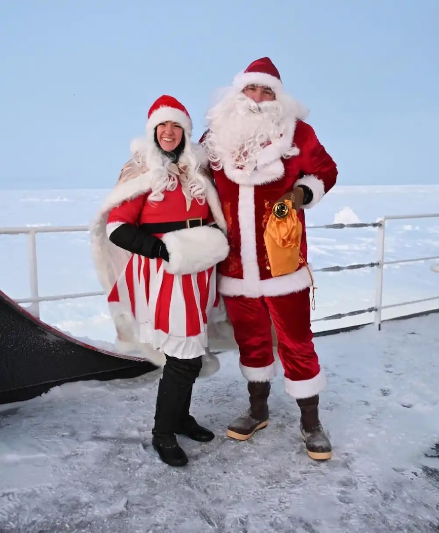 Santa and Mrs. Claus visit the U.S. Coast Guard Cutter Healy at the North Pole, Oct. 2, 2022. U.S. Coast Guard photo Auxiliary Public Affairs Specialist 1Deborah Heldt Cordone.
