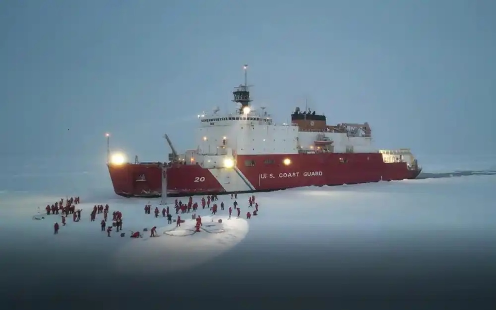 U.S. Coast Guard Cutter Healy crew members and science team enjoy ice liberty at the North Pole, Oct. 2, 2022. U.S. Coast Guard video photo by Chief Petty Officer Roy Mesen Scott.