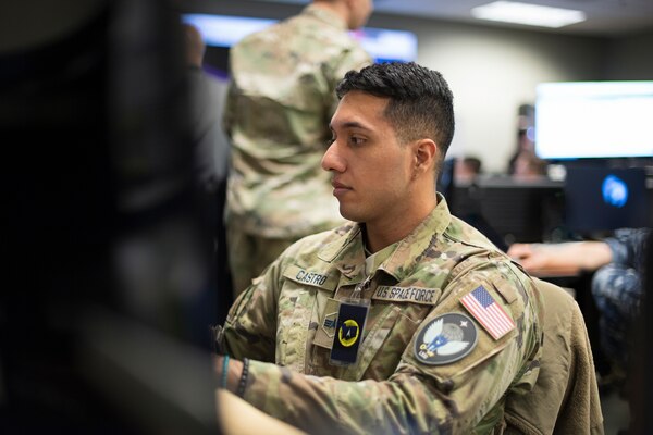 U.S. Space Force Spc. 4 Cesar Castro, 71st Intelligence Surveillance, and Reconnaissance Squadron, Detachment 4, disseminates intelligence assessments to drive simulated combat operations during SPACE FLAG 23-1