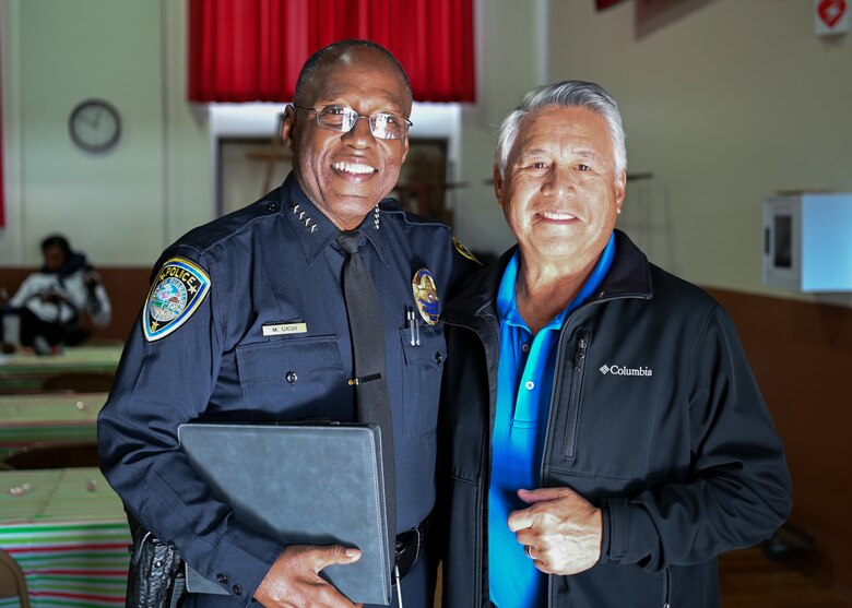 Michael Cash, city of Guadalupe chief of police, and Ariston Julian, city of Guadalupe mayor poses for a photo together, as they prepare to greet the Veterans, Airmen and Guardians that are attending the Armed Forces luncheon, Dec. 17, 2022 at Guadalupe, Calif. Rancho Guadalupe was settled by pioneers of many unique backgrounds, such as European, Chinese, Filipino, Japanese, and Mexican. (U.S. Space Force photo by Airman 1st Class Tiarra Sibley)